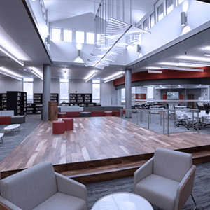 Interactive Media Center at Hunterdon Central Regional High School, with gray chairs, bookshelves, and a raised platform.